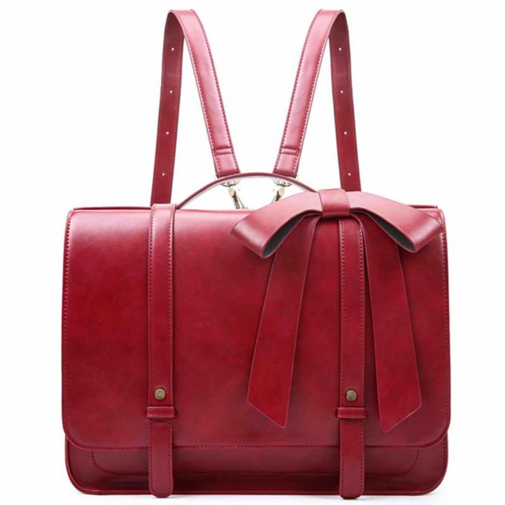 Knot | Sac rétro torsion en bleu-rose 