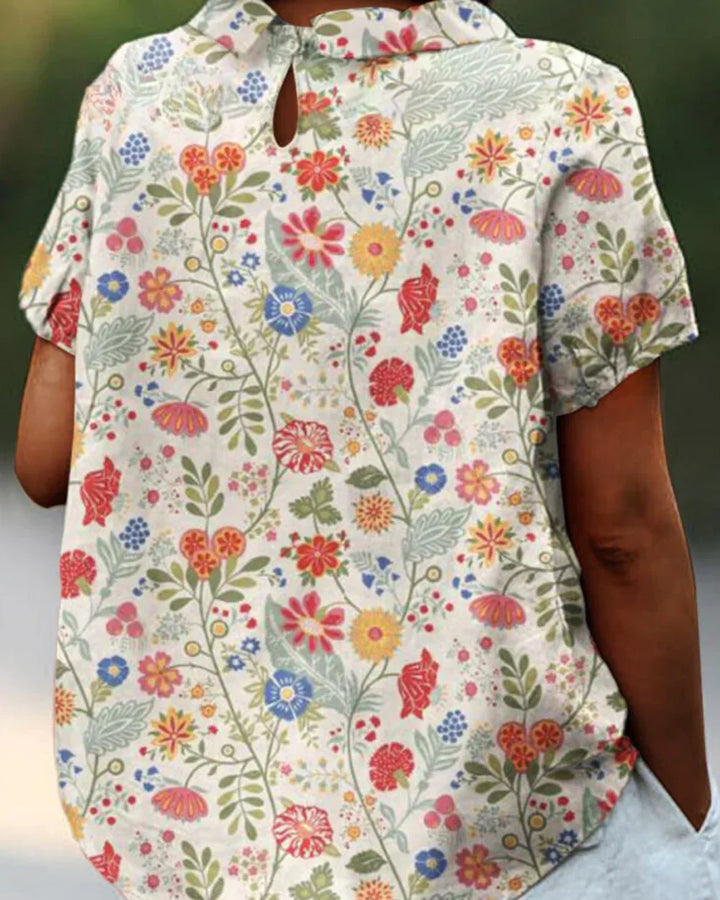 Joanne - Chemisier fleuri chic 