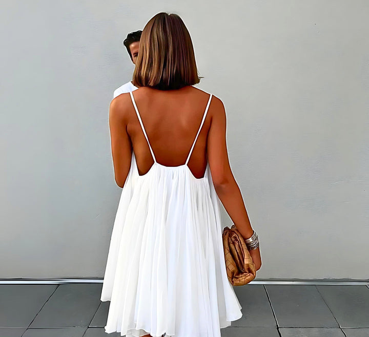 Mio™ | Élégante robe mini dos nu 
