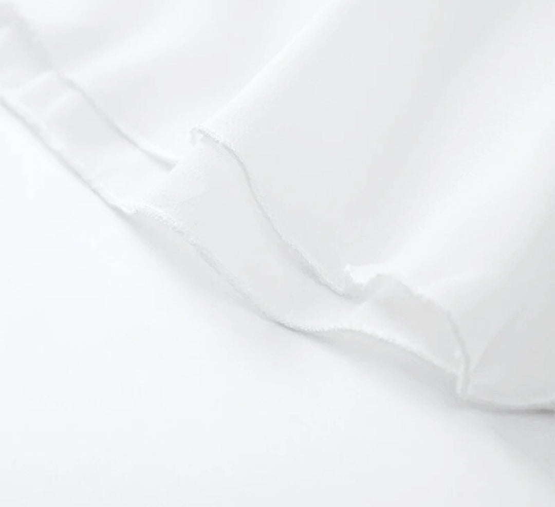 Mio™ | Élégante robe mini dos nu 