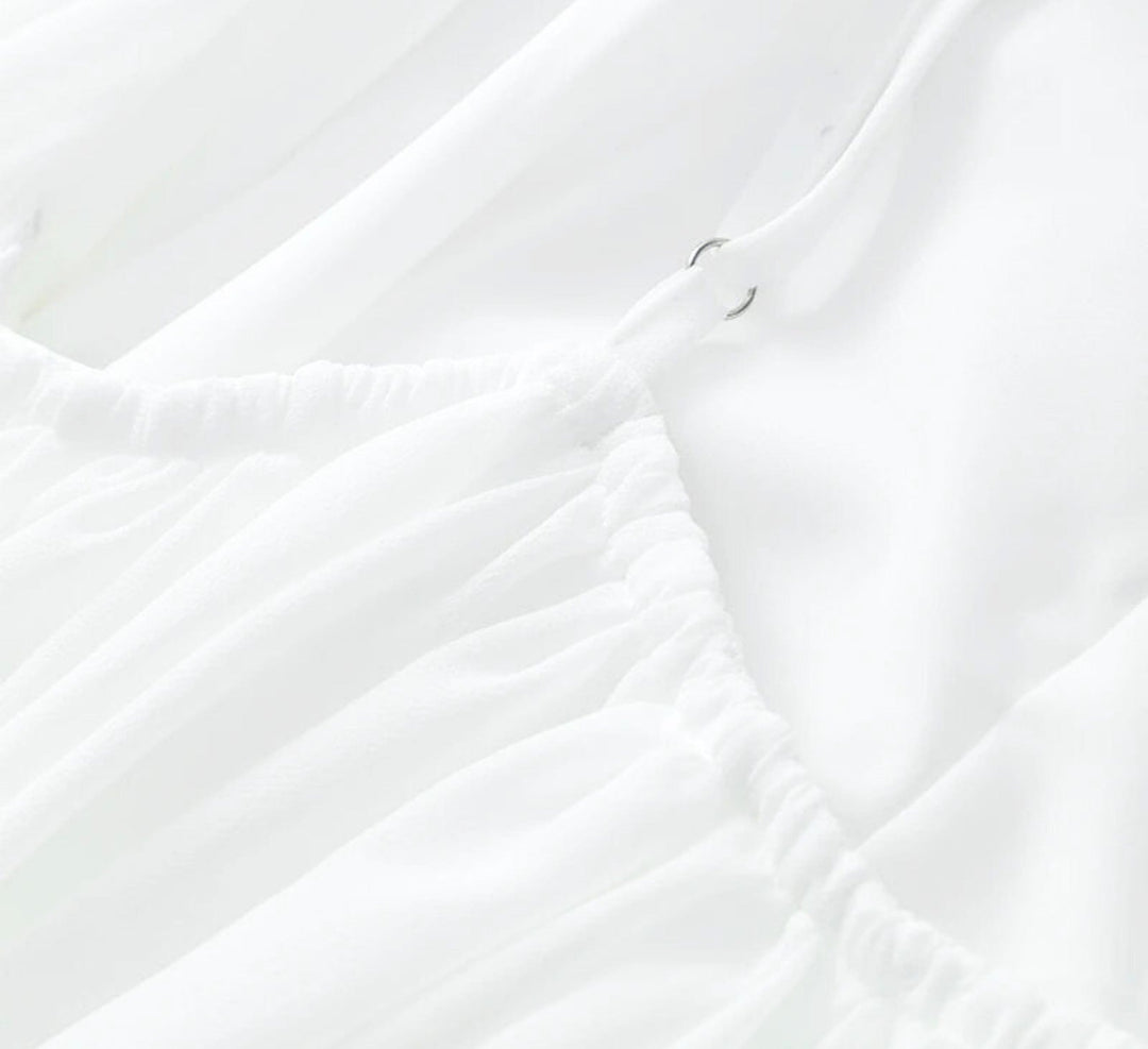 Mio™ | Élégante robe mini dos nu 