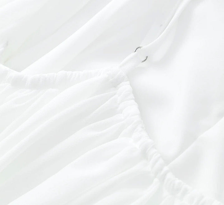 Mio™ | Élégante robe mini dos nu 
