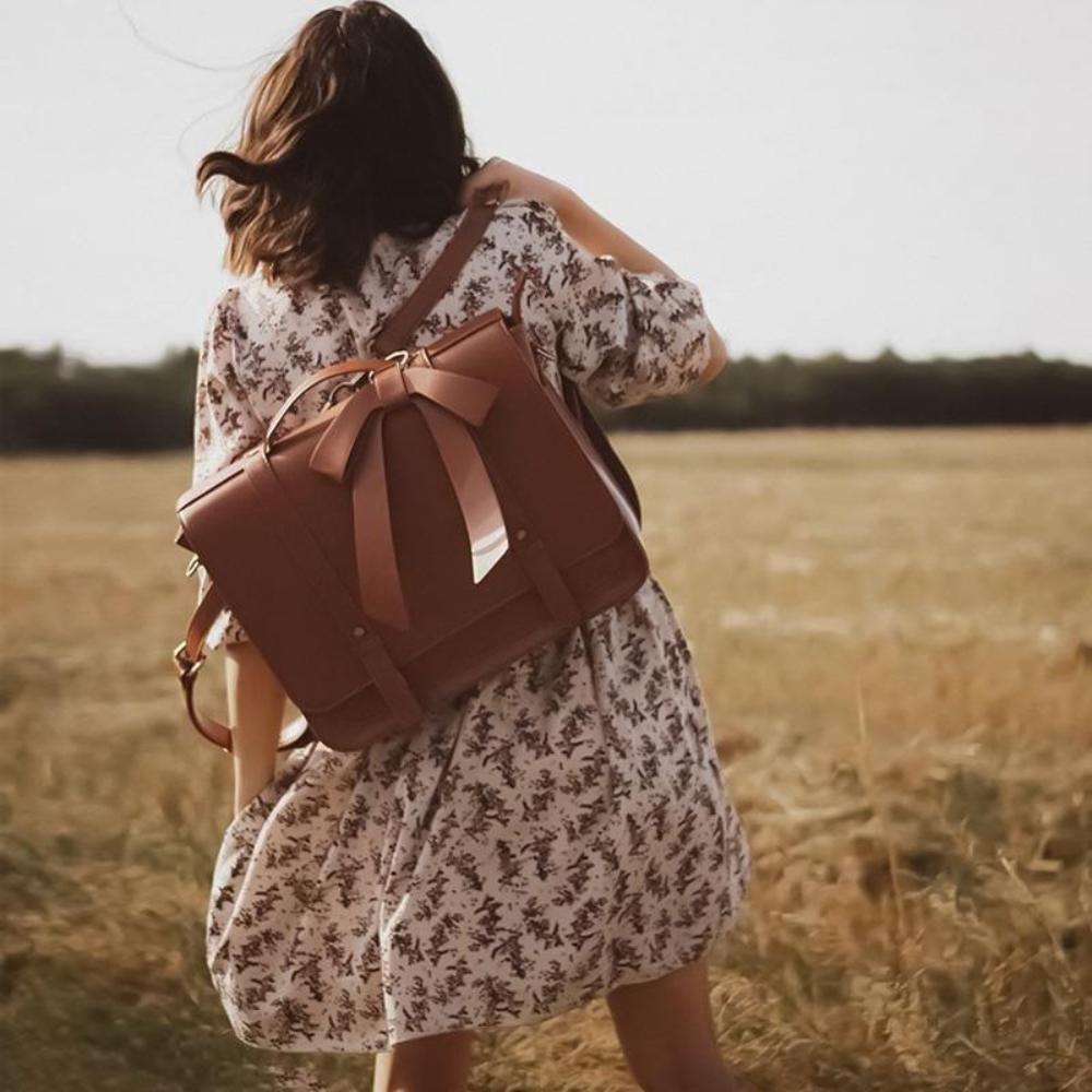 Knot | Sac rétro torsion en bleu-rose 