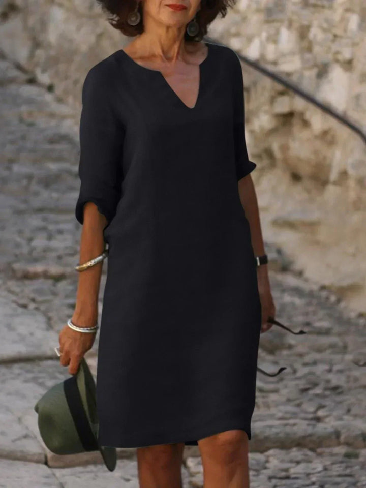 Saoirse™ - Robe à col en V qui cache le ventre 